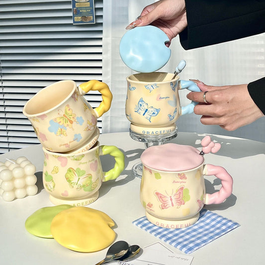 Lot de 2 tasses en céramique décor papillon