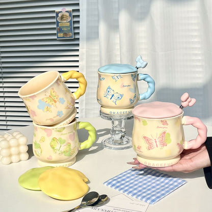 Lot de 2 tasses en céramique décor papillon