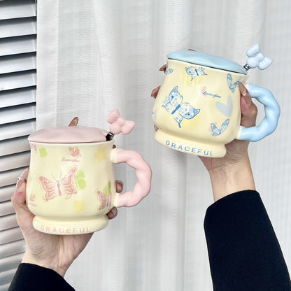 Lot de 2 tasses en céramique décor papillon